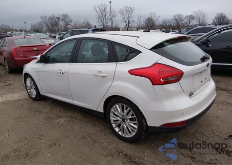 2015 Ford Focus Titanium z USA, uszkodzony, nr VIN 1FADP3N20FL378745